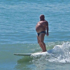 Big-Surfing Man